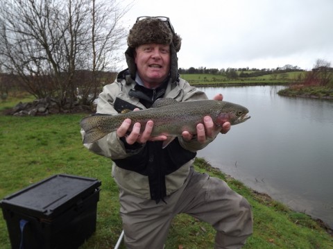 Freddie Miller from Dublin with a fine fully finned Rainbow