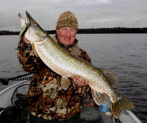 Mick Flangan with one of his double figure pike