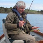 Irish fly fisher Liam Stenson cradles a Roundwood brownie