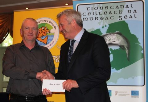 Brian McShane Receives his CSTP Award from Minister O'Dowd