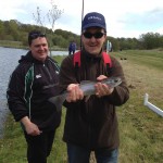 Peter of L’Arche Community Callan with a lovely rainbow trout at Mount Juliet Lake