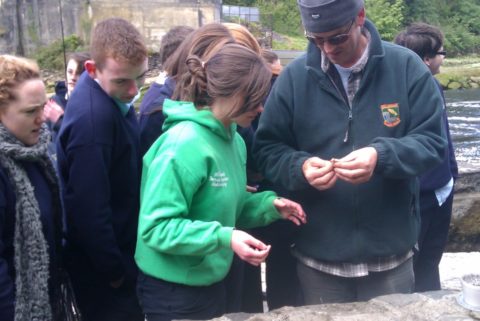 Some of the Transition Year students being shown how to put a worm on a hook