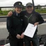 Angling Council of Ireland Coach Ian Warburton receiving his Certificate from local Gardai