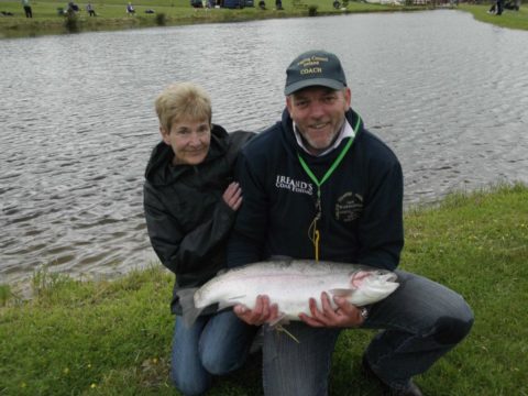 Angling Council of Ireland Coach Ian Warburton with Lilly and her record breaking catch.