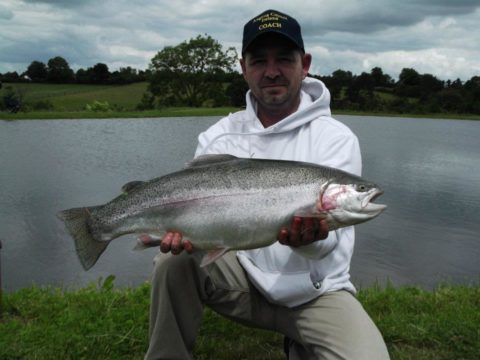 Carlow C.A.C. Chairman Gerry mcstraw with Lillies prize fish