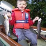 Jack Rosney 7 years of age from Eyrecourt, Co Galway with his two 1½ trout taken from Owel on Sunday evening.