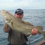 Marcel with a 8kg Cod.