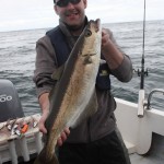 Glen Drennan hooks a pollack