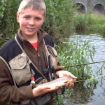 Thomas aged 12 with trout