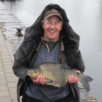 Great coat, great smile, great fish !