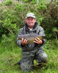 Graeme Sargeant from Ipswich with his 6lb 3 oz Tench which wins our Catch of the Week