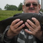 Guus with a Tench from his mixed bag