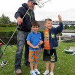 Ian Warburton with two happy anglers