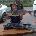 Johnny Cregan with his 11lb Bass caught at Fanore. Mr. Johnny Cregan Snr standing behind.  Photo taken by Mr Pat Moore