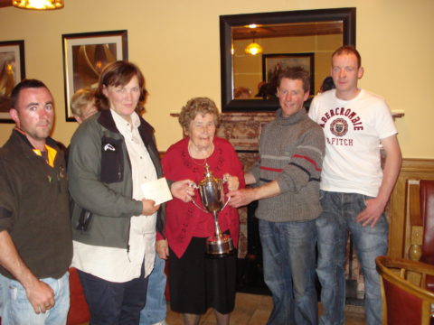 L/R Derek Madden Club Chairperson, Joint winner Dorrie Gibbons, Nancy Malone presenting the Michael Malone perpetual Cup, Michael McDermot joint winner, and Sean Mitchell Treasurer.