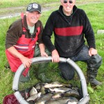 John and his friend “The Bird Man” with some Bream and Tench from their catch.
