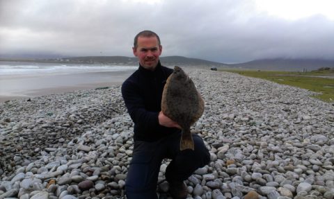 Peter Atkins with his 2lbs 14oz (44cm) flounder taken on Keel beach, Achill 