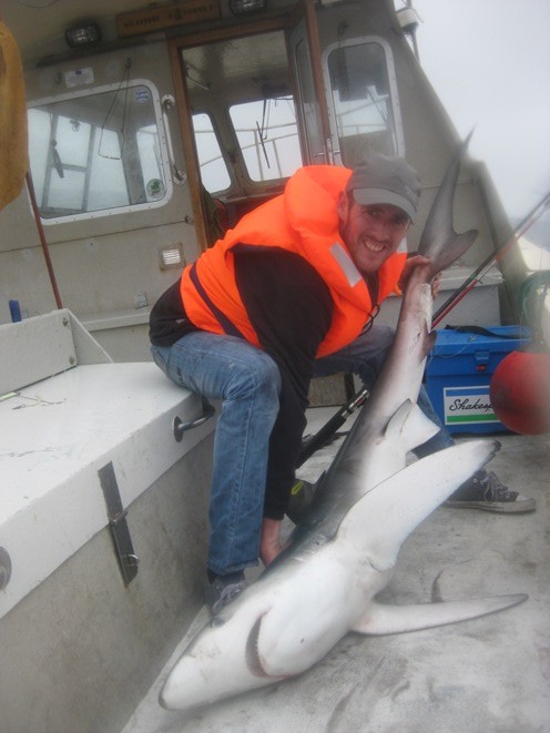 DM had his first shark - a fine 90lb blue on the charter boat Rooster