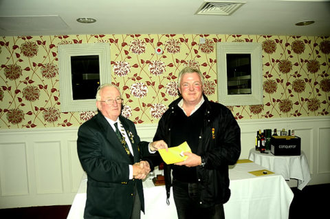 Being presented with a prize by IFSA President Pat Walsh
