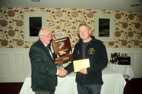 Winner Shane Gilvarry of Newport SAC being presented with the Jimmy Smith Trophy by IFSA President Pat Walsh