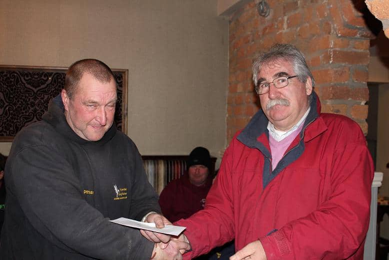 Winner of Today's Event Andy Chapman Receives His Prize from Richard Caplice