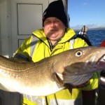 Joe Lynch doing some weight lifting with a fine cod !