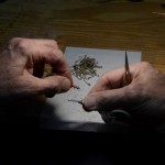 Jim Finn ties and sell files and leads fishing trips to Ireland He is shown here in his basement workshop where he ties his flies