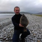 Peter Atkins of Galway Bay SAC with a fine 46cm flounder of 2lb and 14oz