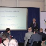 The Minister addresses the crowd at the launch