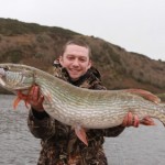 Ross Macklin of Lee Reservoirs Angling Service whose rod rod collapsed suddenly under a weight of a massive pike that nailed his fly; a brightly coloured Danish Pastry fished on a Hi-D line.  His fish wins our Catch of the Week
