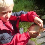 Young Angler with Fish