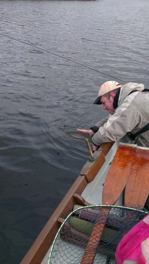 Peter Boyle releases a fish on the first day of the season