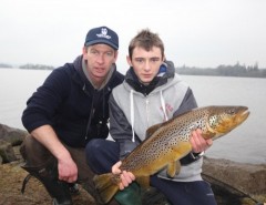 Des Chew and 16 year old Eric Cahill pose with the 12lb trout before releasing it back to the lake. Eric is our "Catch of the Week" winner. Well done, a fine fish.