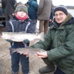Young Iarfhlaith Gallagher and Peter Flatley pictured at Lough Rowan on restocking day last week
