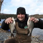 Mark Heffernan with two of the winning fish.