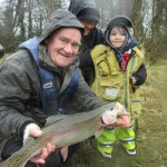 Noah Johnston and his Granddad with Noah's first fish