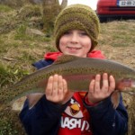 Rian Murphy aged 8 from Inchicore Dublin with his fantastic rainbow trout, caught on a recent trip to Lough Rowan