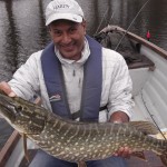 Azim from Paris with his fat 15lb Pike from Lough Derg