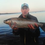 Gene Brady, Ballinagh holding a superb trout estimated to be over 8 lb.