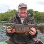 Jim O’Reilly with his 6 lb trout caught on a green wulff