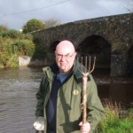 Fishery officer with a fork used for spearing fish in 2009