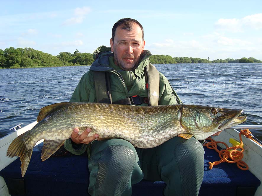 Maciej Krajewski with a fine pike of 117.5cm, that weighed 30lbs 9oz, landed on Lough Corrib, June 2013. The fish was carefully released after the photograph.