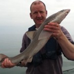 Carrigaline Club Secretary Ken Hegarty with one of this specimen smooth hounds