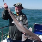 Christy Lane with his cracking Hound of 16.25lb weighed after hours in the live-well