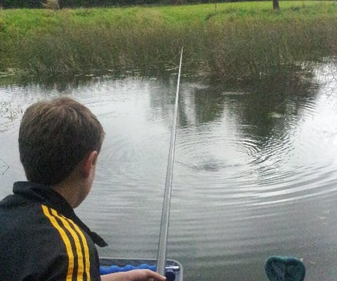 Playing a tench on the pole
