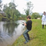 Young Pete Pagano playing a lively fish on the Sheet of Water