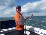 Wicklow still producing Tope, Bull-Huss and Hounds, and good fishing for the young ones Anthony Greene with his specimen tope taken offshore in 34Metres of water