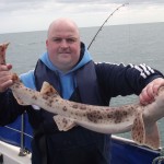 Paul Darcy shows off one of his fine Bull Huss.