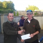 Gary Madden receiving 1-st prize from Chairman Derek Madden at the O Flynn big fish challenge
