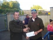 Gary Madden receiving 1-st prize from Chairman Derek Madden at the O Flynn big fish challenge